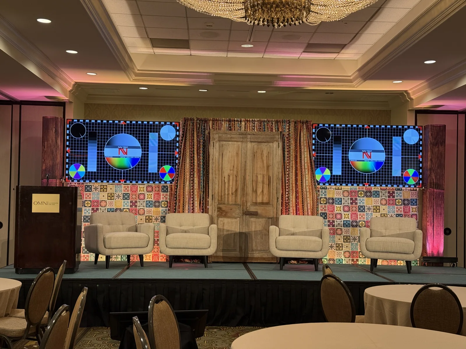 Omni San Antonio corporate conference with dual LED walls and pink uplighting — Nashville Audio Visual