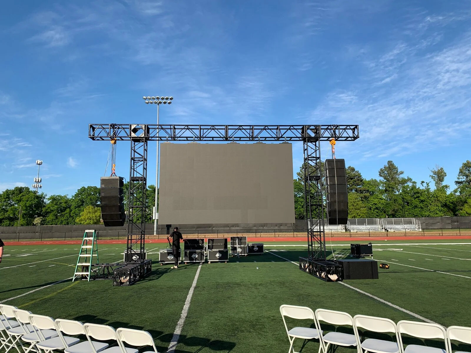 Line array speakers and LED video wall on truss structure — Nashville Audio Visual outdoor graduation production